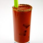 Bloody Mary Cocktail with celery and spiced rim.